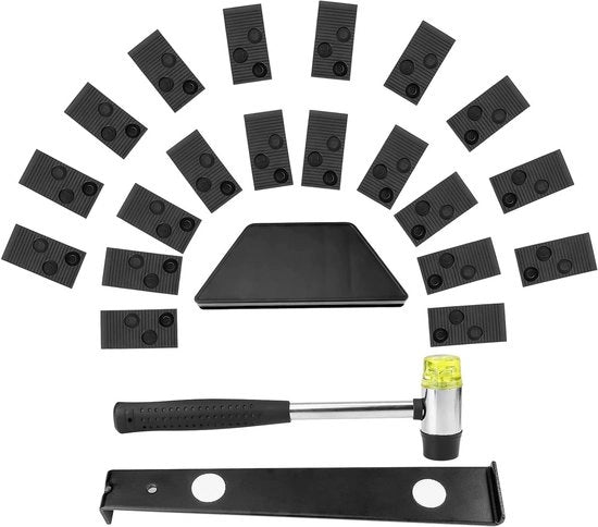 Installazione per pavimenti in lamina con blocco di percussione, maniglia di trazione, martello a due facce e supporti di distanza.