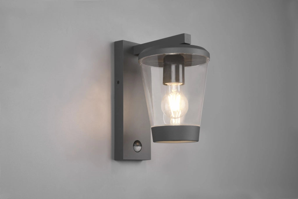 CAVADO APPLIQUE DA ESTERNO ANTRACITE CON DIFFUSORE TRASPARENTE IP44 CON SENSORE MOVIMENTO H. 28CM 1 LUCE ATTACCO E27