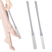 Borsetta per pulizia e peeling con setole in silicone e manico lungo