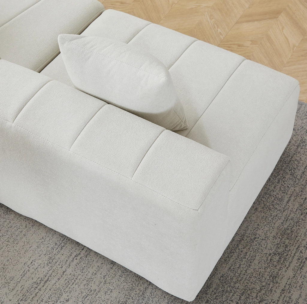 Modulo divano curvo in ciniglia beige con 2 cuscini