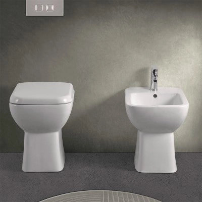 Coppia wc e bidet con scarico a pavimento e copriwc originale Ginevra