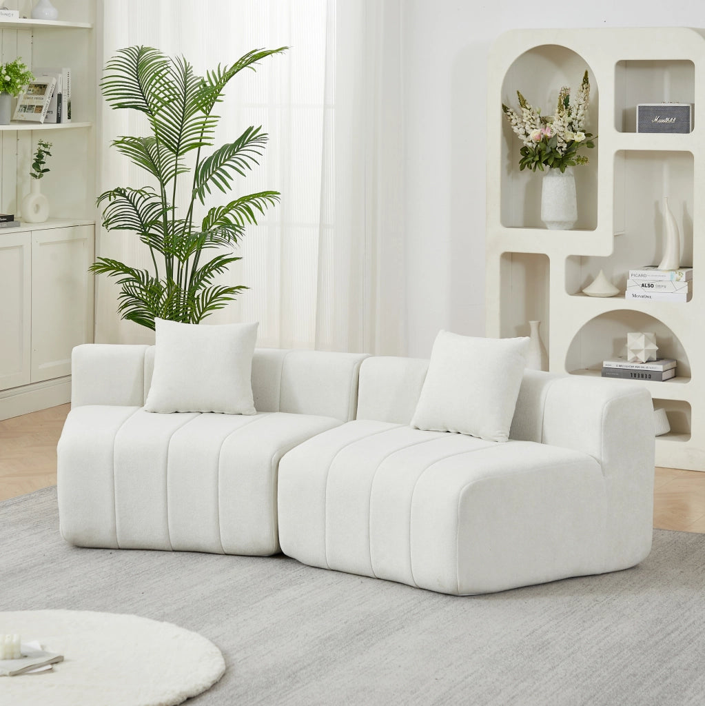 Modulo divano curvo in ciniglia beige con 2 cuscini