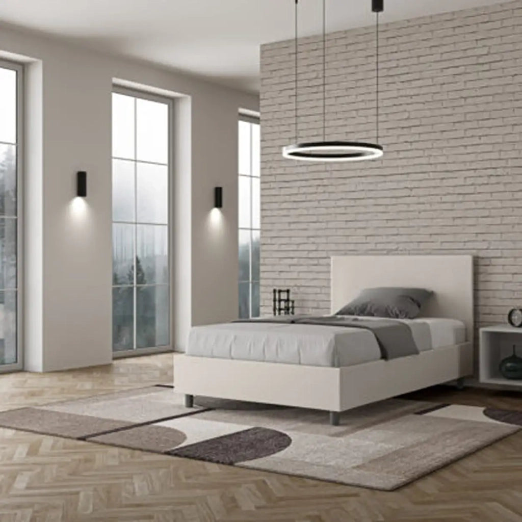 Letto una piazza e mezza contenitore imbottito 120x190 similpelle bianco Adele