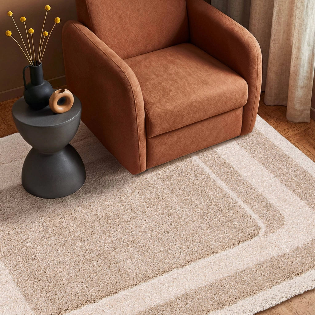 Tappeto da interno con motivo grafico beige e crema