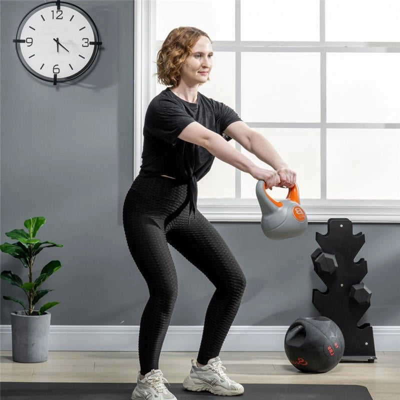 KETTLEBELL 8 KG IN PU E SABBIA CON BASE PIATTA 20 X 14 X 24 CM ARANCIONE