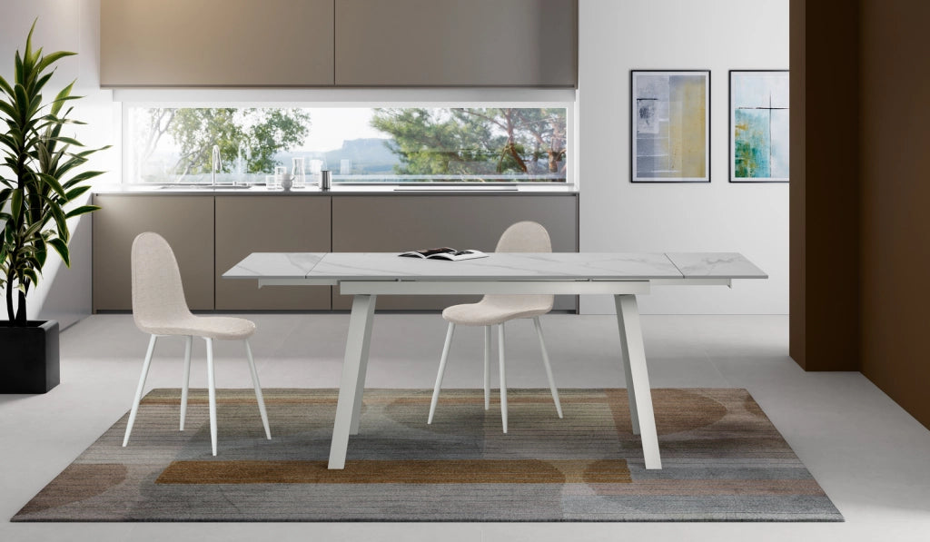 Tavolo allungabile Dylan con top in ceramica marmo bianco opaco e gambe in metallo bianco - Dimensioni 140/200x80 cm - Design Moderno