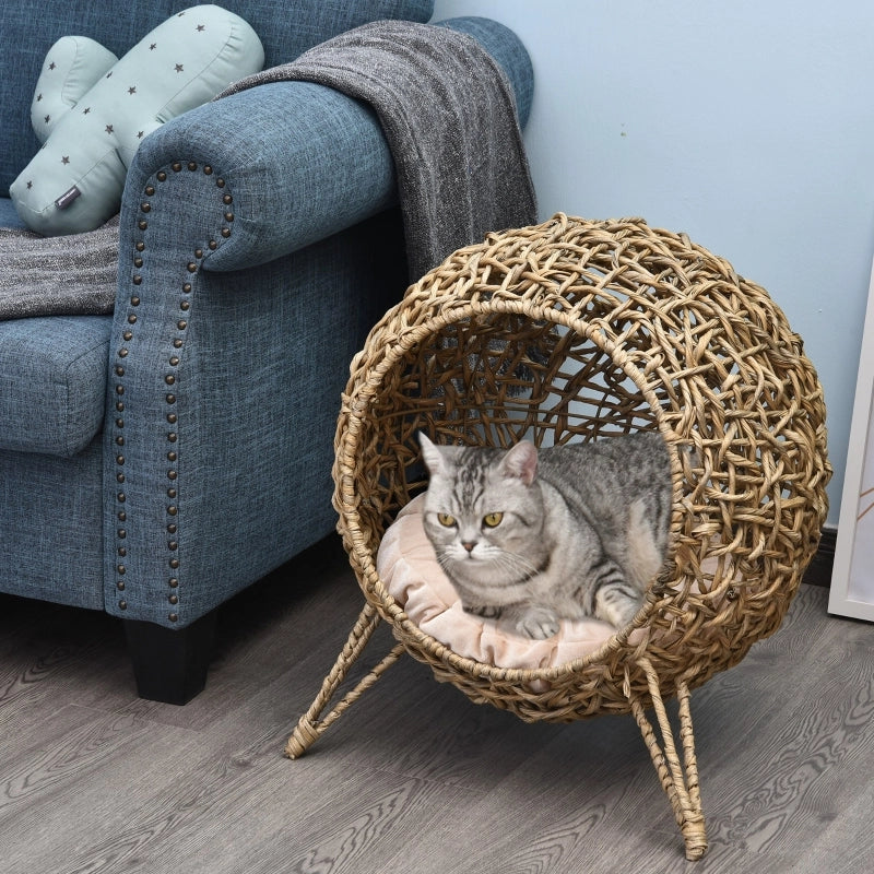 Cuccia per gatti in rattan PE intrecciato con cuscino; struttura in filo metallico e piedini rialzati marrone
