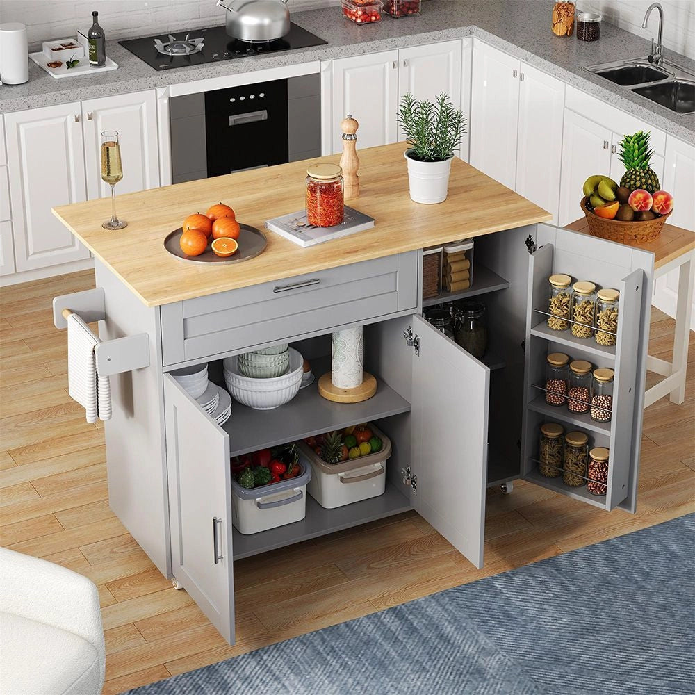 Tavolo da cucina mobile con piano ribaltabile - Xylo - 132,5x44x90 cm - Venatura quercia - Multifunzionale con scaffale spezie, porta asciugamani, 5 ruote